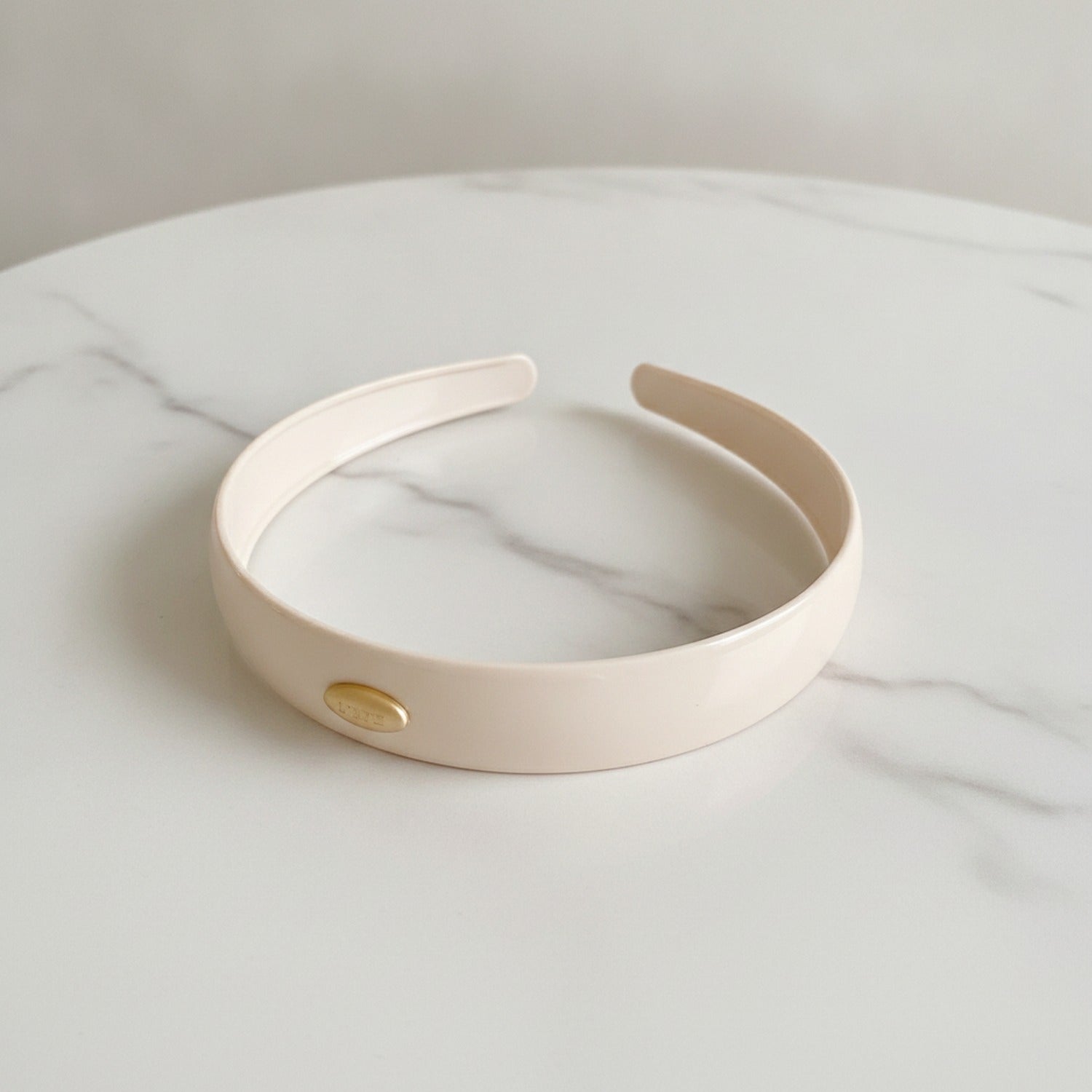 Cream Oval Gold Charm Padded Headband