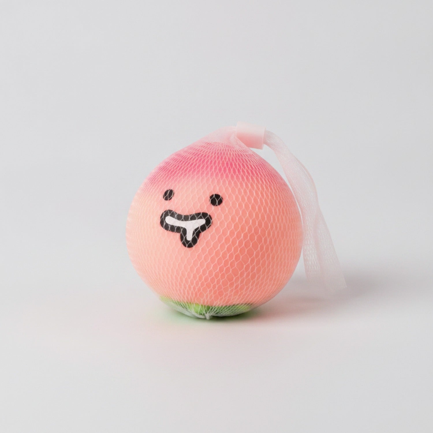 Pink Lychee Squishy With Smiling Face Charm
