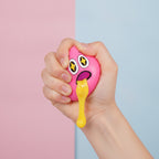Starry-Eye Emoji Vomit Squeeze Toy - Pink