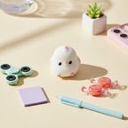 White Fuzzy Ghost Squishy With Pink Cheeks