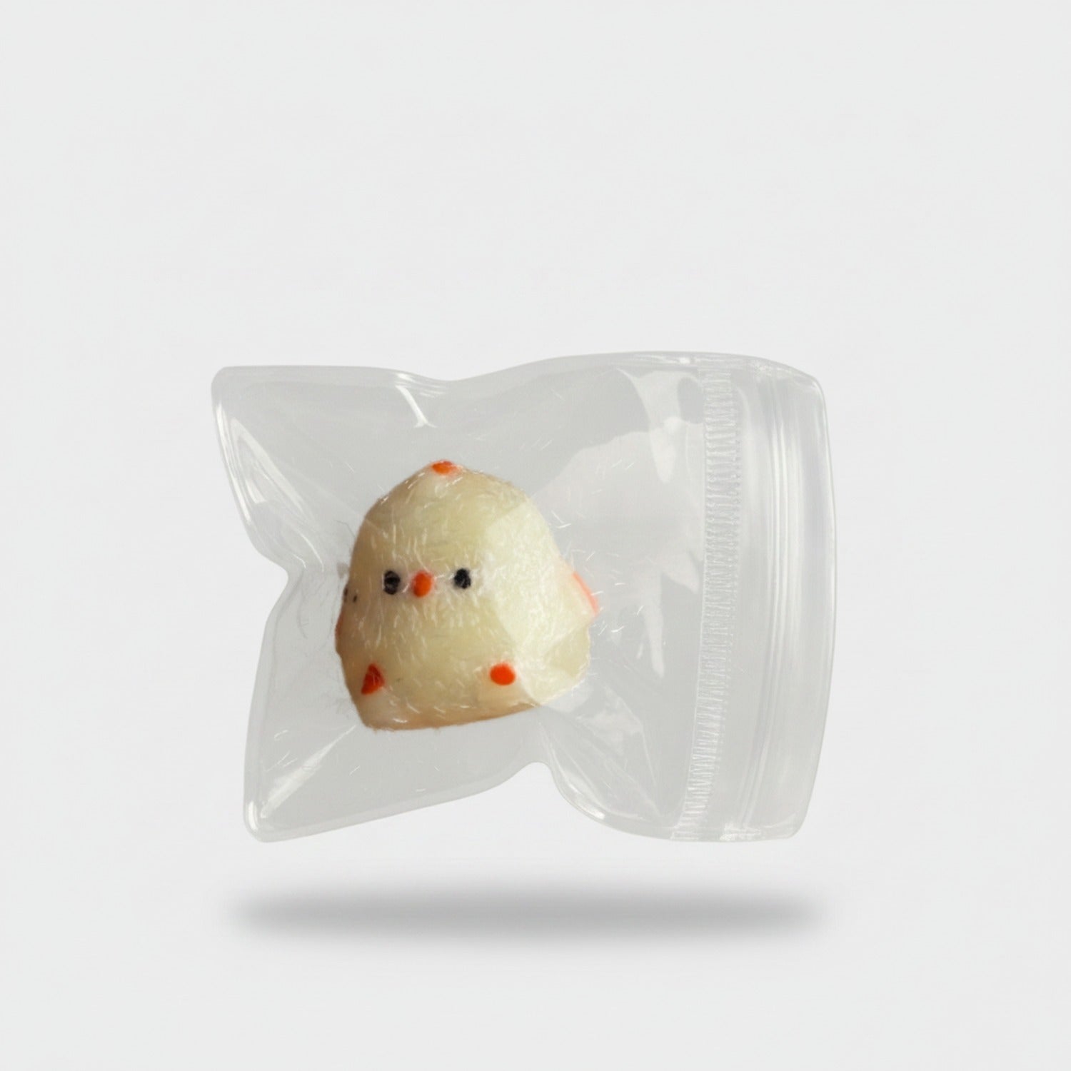 Cream Chick Squishy with Orange Details