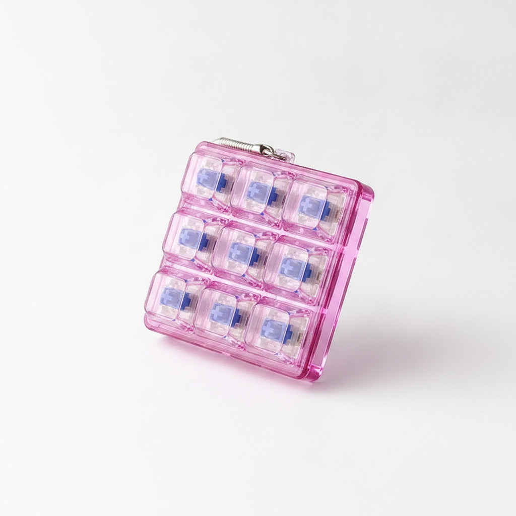 9 Key Fidget Switch Tester Keychain Toy - Pink