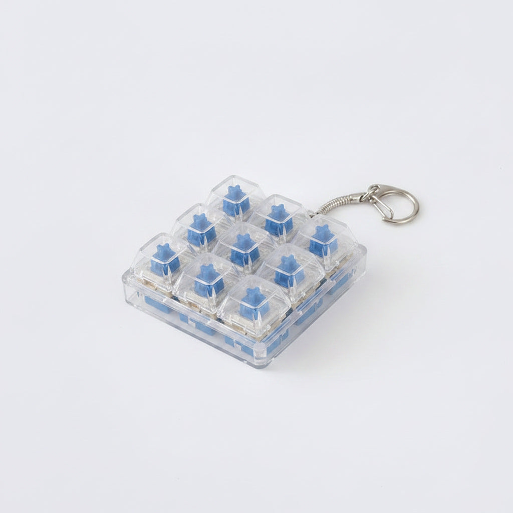 9 Key Fidget Switch Tester Keychain Toy - White