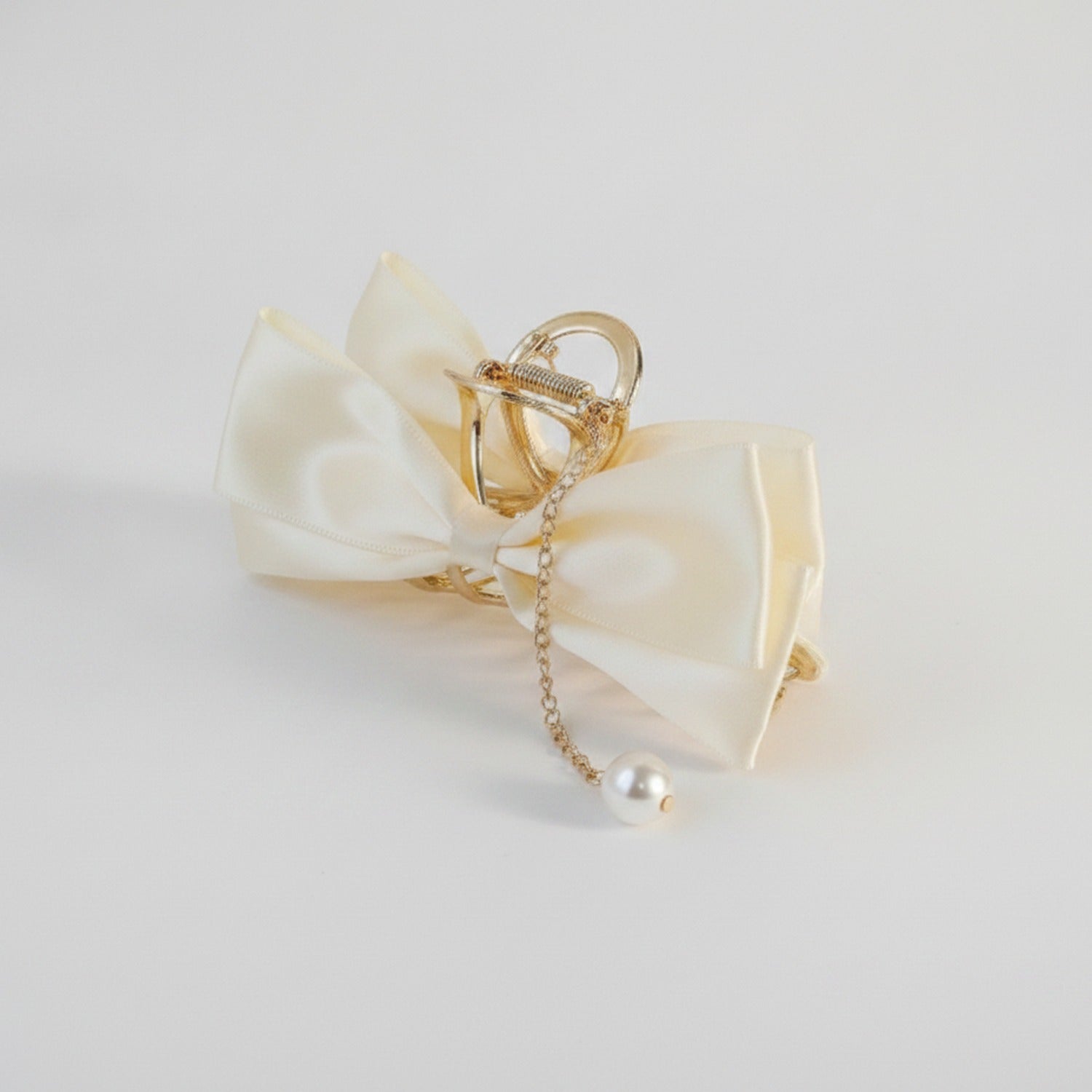 Cream Pearl Charm Bow Hair Claw