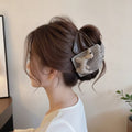 Brown Leather Hair Claw With Beaded Bear Charm – hair accessories (view 1)
