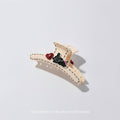 Cream Stitched Hair Claw With Charm Details – hair accessories (view 1)