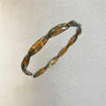 Tortoiseshell Twisted Hair Headband With Accents - Blue – hair accessories (view 1)