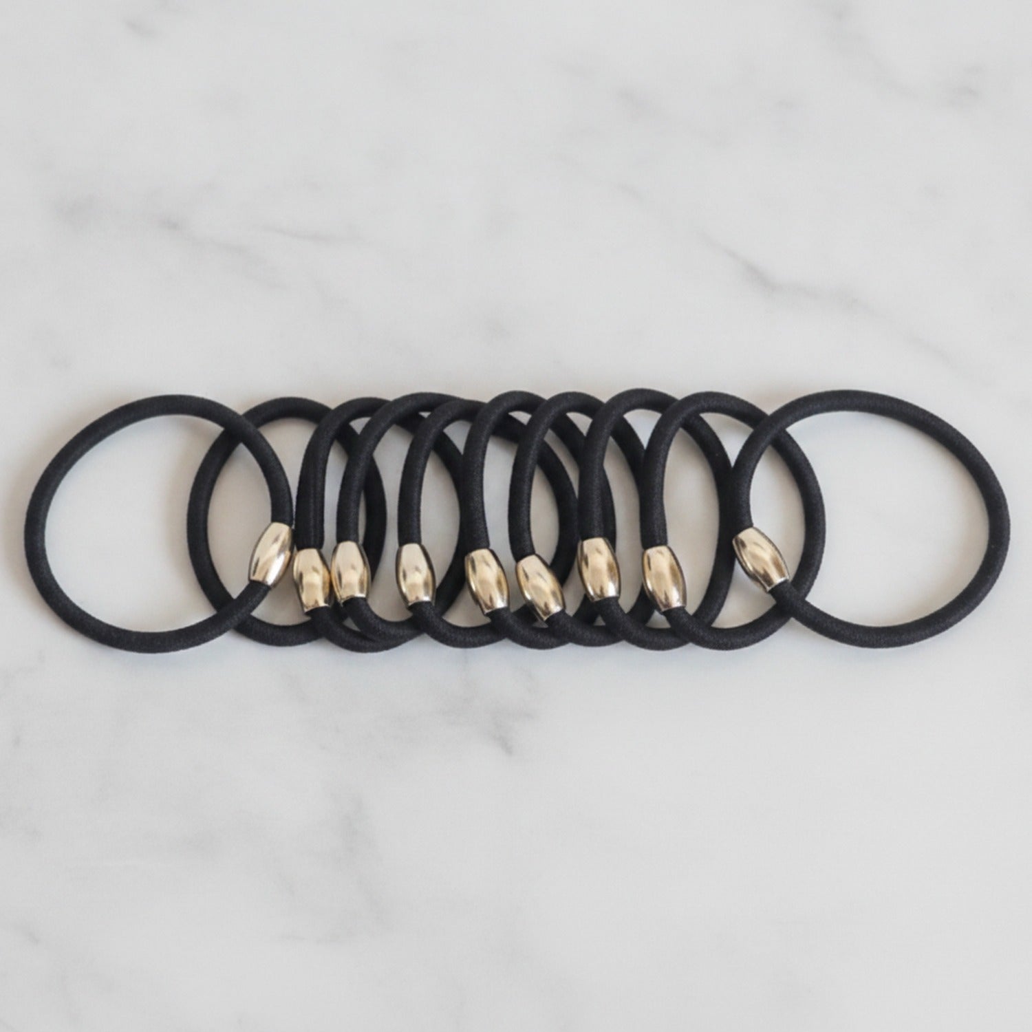 Black Hair Ties With Gold Metal Accents