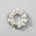 Cream Textured Scrunchie with Black Stitching Details – hair accessories (view 1)