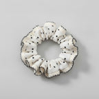 Cream Textured Scrunchie with Black Stitching Details – hair accessories (view 1)
