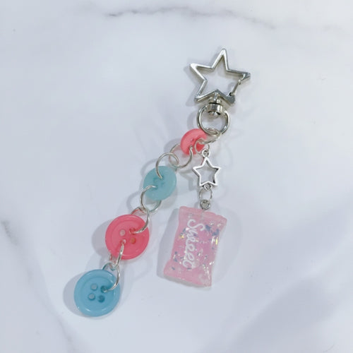 Acrylic Keyring With Star Charm And Button Accents