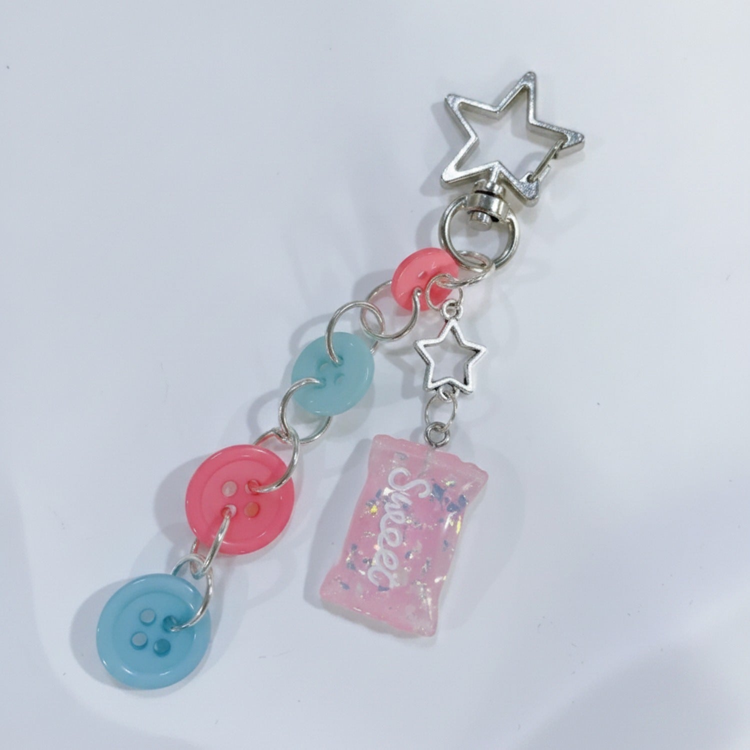 Acrylic Keyring With Star Charm And Button Accents