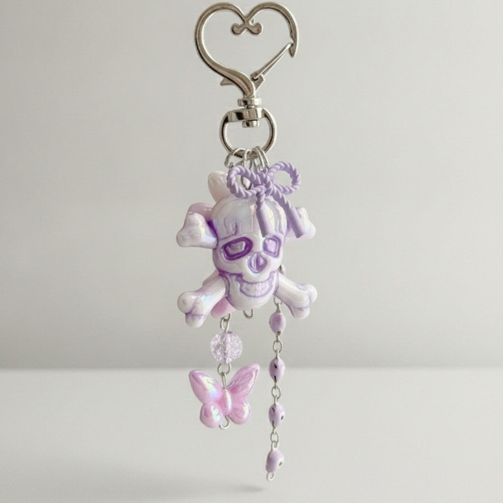 Purple Skull Acrylic Keyring With Butterfly Charm – novelty & toys (view 1)