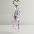 Purple Skull Acrylic Keyring With Butterfly Charm – novelty & toys (view 1)