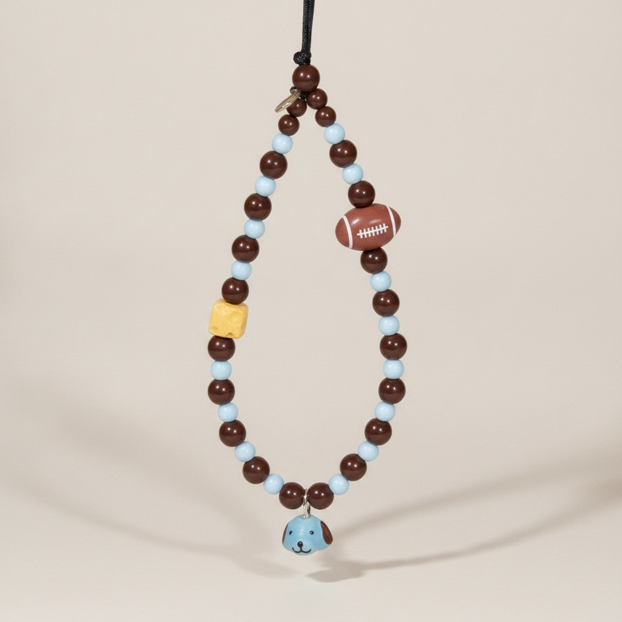 Cute Dog Football Beaded Phone Charm – tech (view 1)