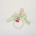 Elegant Bow Cherry Pearl Keychain – apparel accessories (view 1)