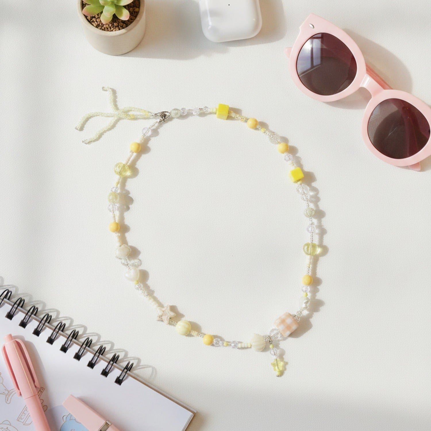Yellow & White Star Beaded Charm With Bow