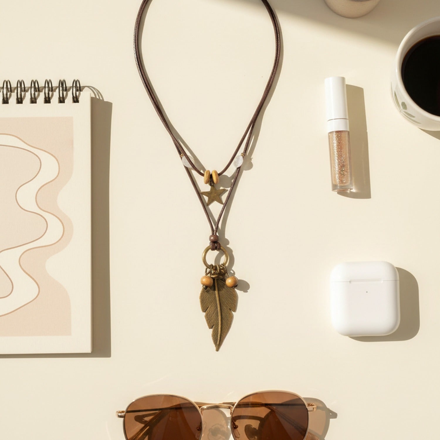 Bronze Star and Feather Charm Necklace