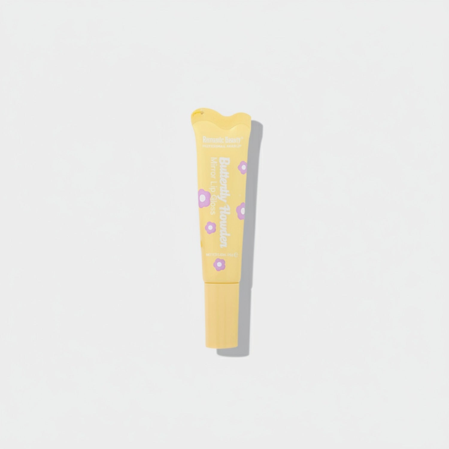 Yellow Lip Balm Tube With Purple Flower Details