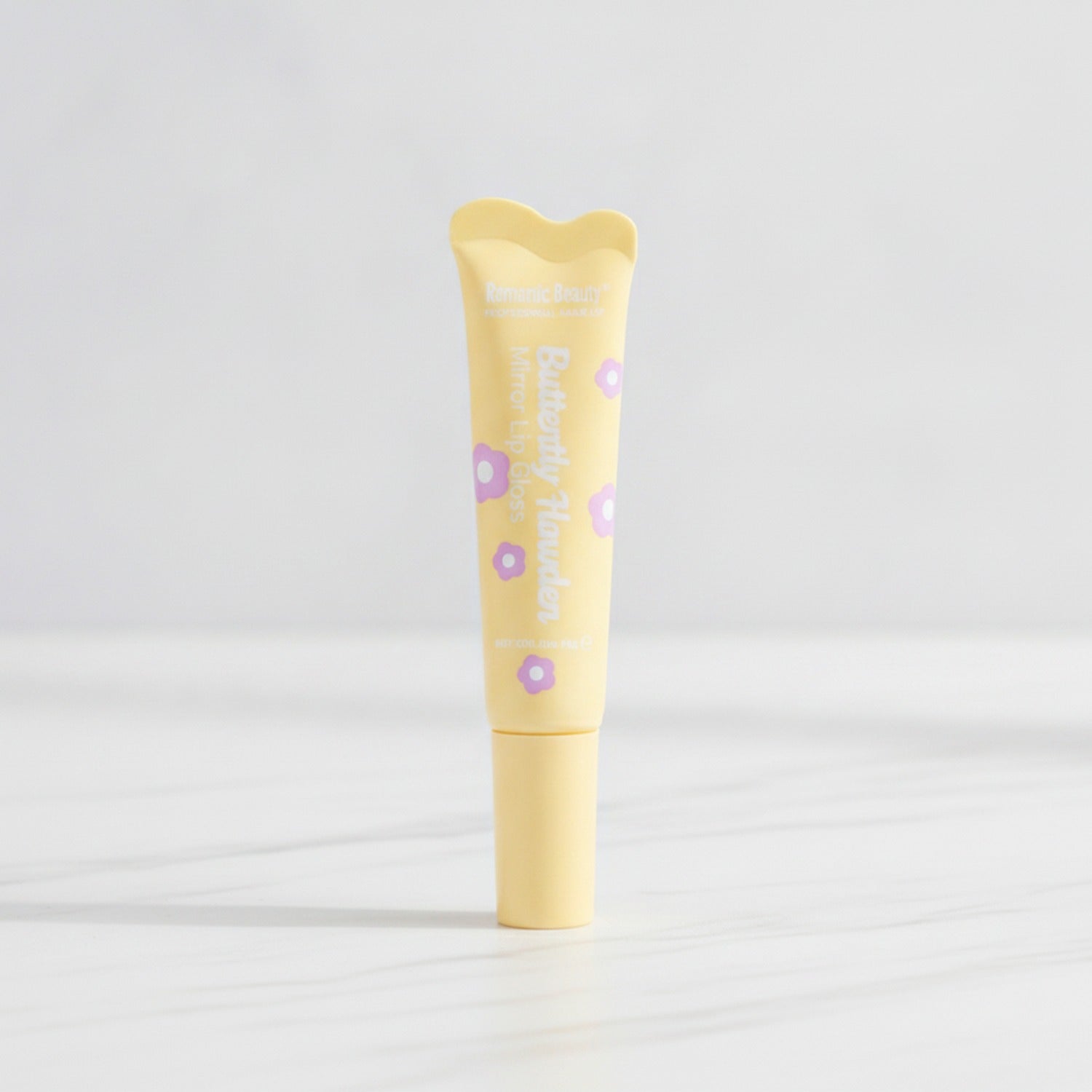 Yellow Lip Balm Tube With Purple Flower Details