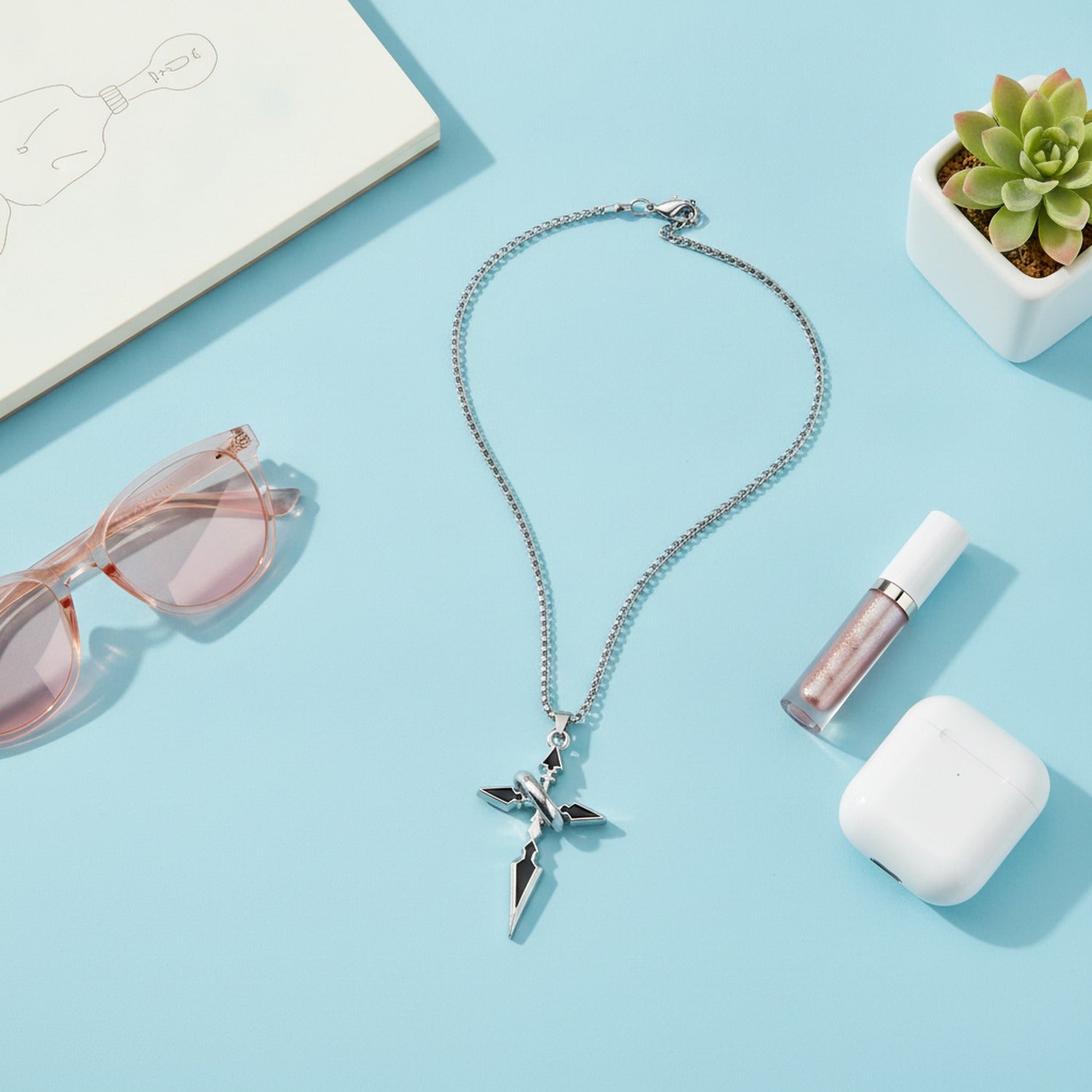 Silver Cross Pendant Necklace with Black Stone Detail