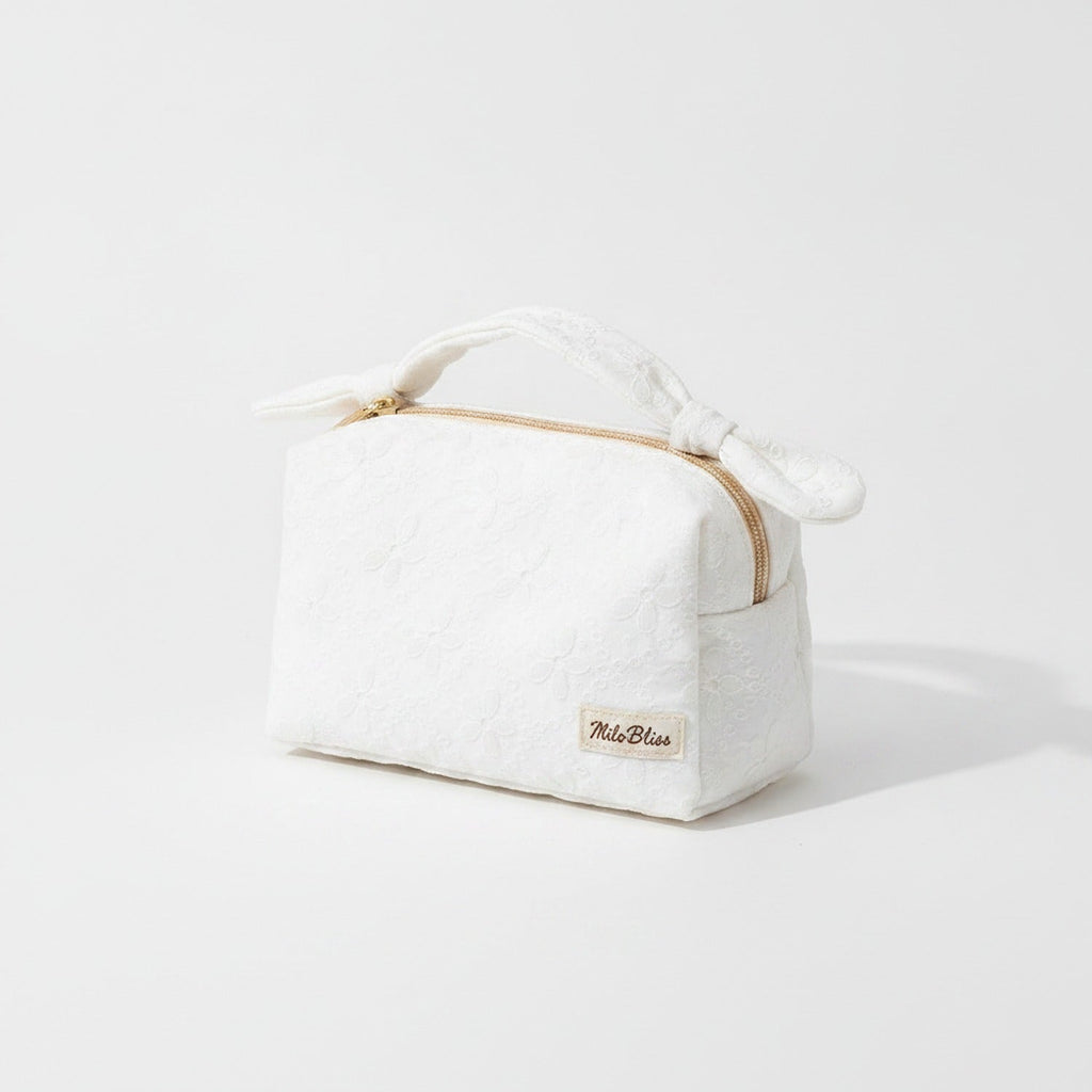 Quilted Cream Cosmetic Bag With Bow Handles – bags & wallets (view 1)