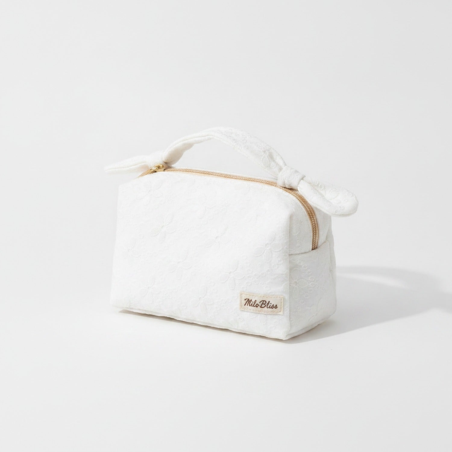 Quilted Cream Cosmetic Bag With Bow Handles