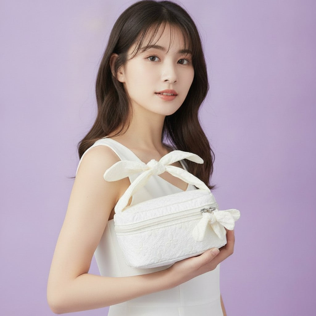 Quilted Cream Cosmetic Bag With Bow Handles