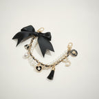 Luxury Bow Pearl Bag Charm Strap – bags & wallets (view 1)
