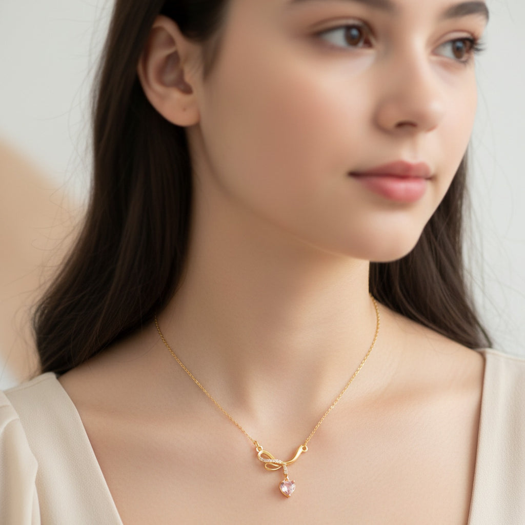 Gold Heart Pendant Necklace With Rhinestone Bow