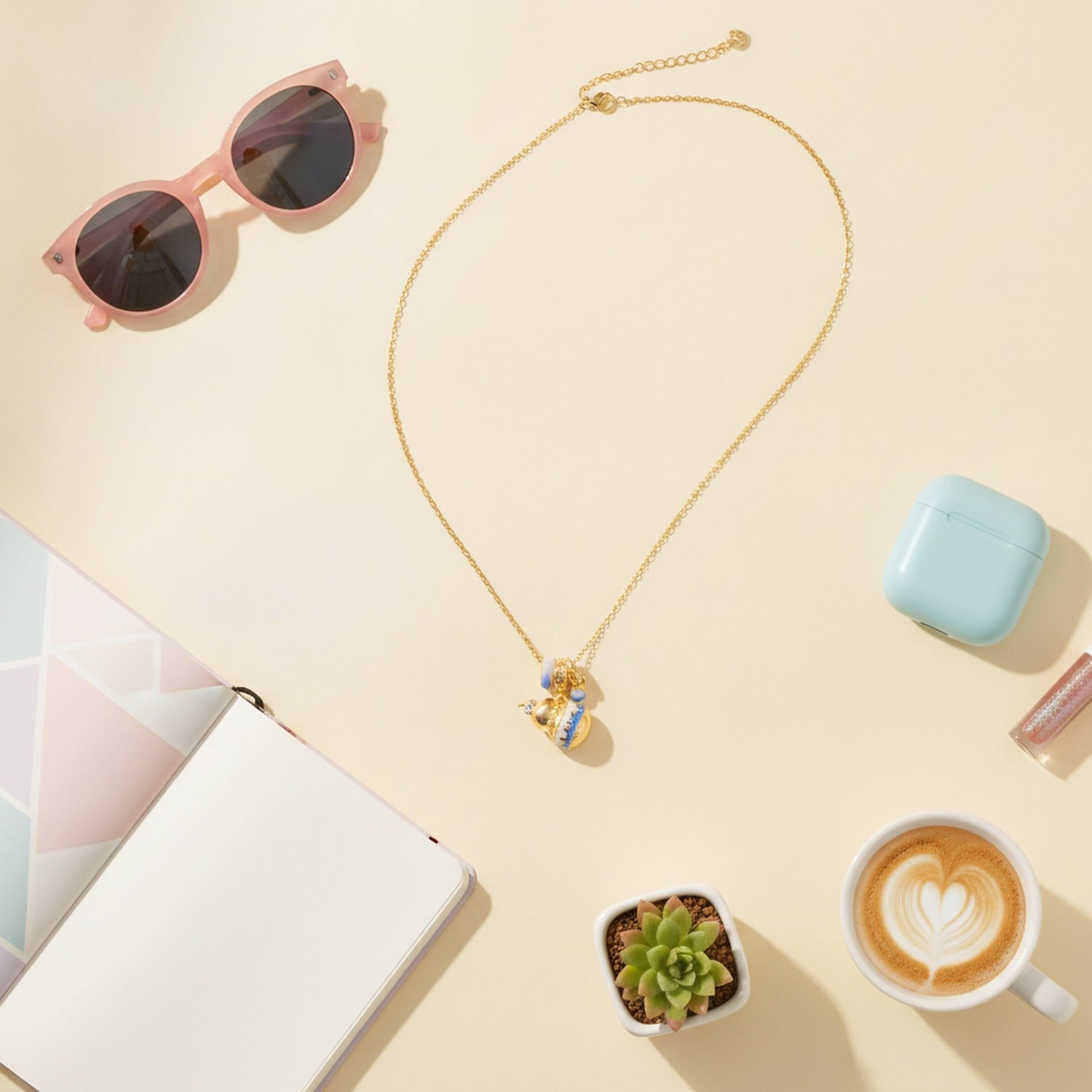 Gold Charm Necklace with Blue Accents