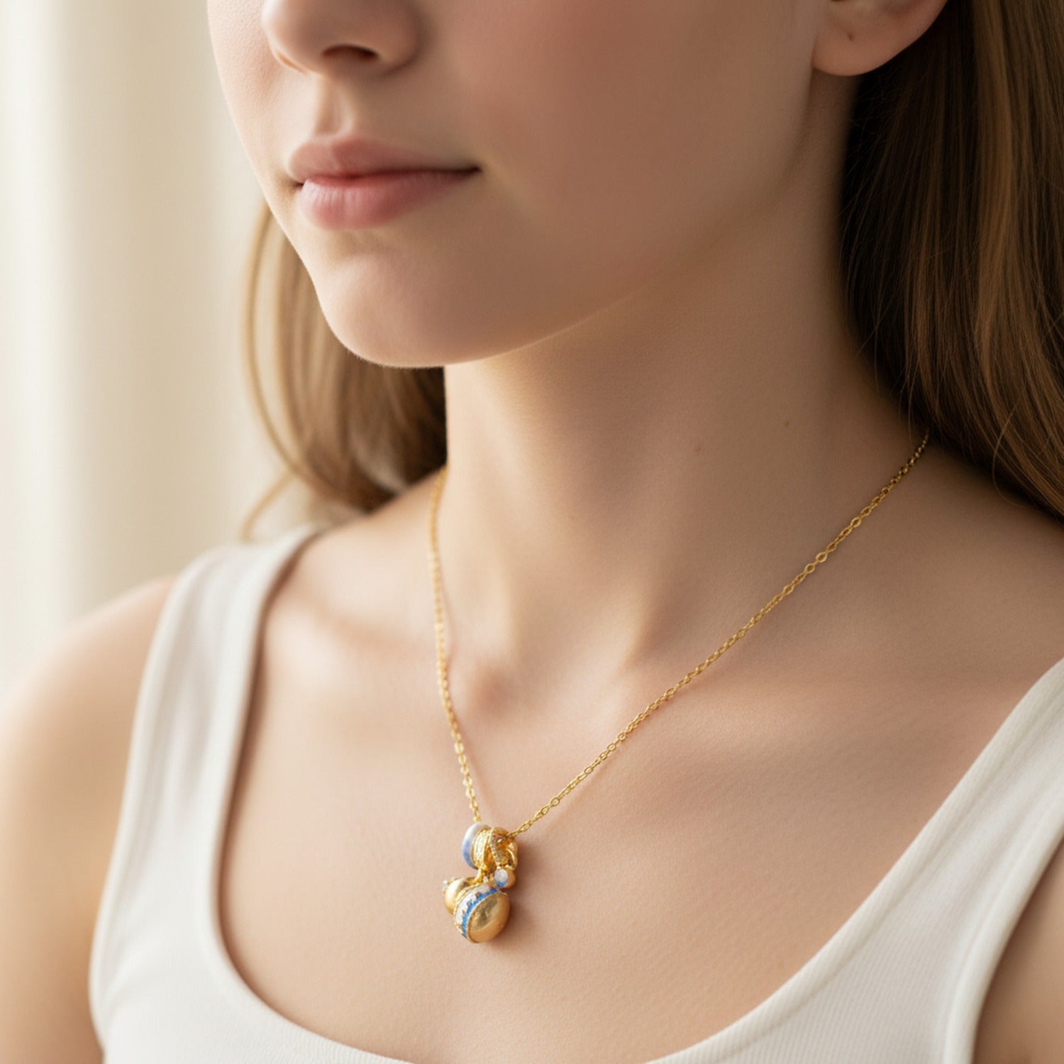 Gold Charm Necklace with Blue Accents