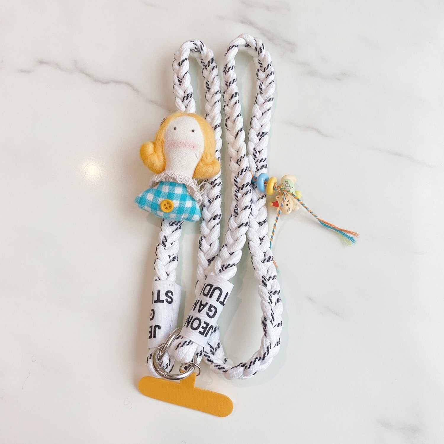Rope Phone Charm With Doll And Tassel