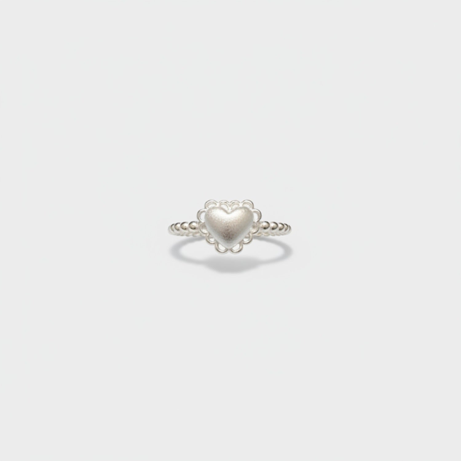 Silver Heart Ring With Scalloped Frame