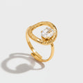 Gold Oval Textured Ring With Cubic Zirconia