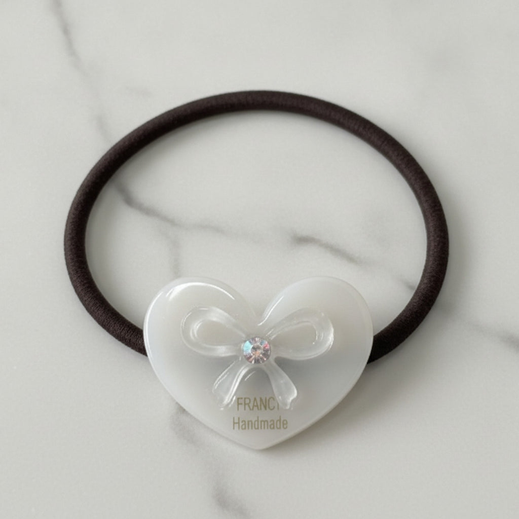 Heart-Shaped Hair Tie With Bow Charm – hair accessories (view 1)