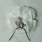 Cream Linen Scrunchie With Black Pearl Bow – hair accessories (view 2)