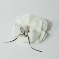 Cream Linen Scrunchie With Black Pearl Bow – hair accessories (view 1)