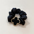 Black Scrunchie With Gold Clover Charm – hair accessories (view 1)