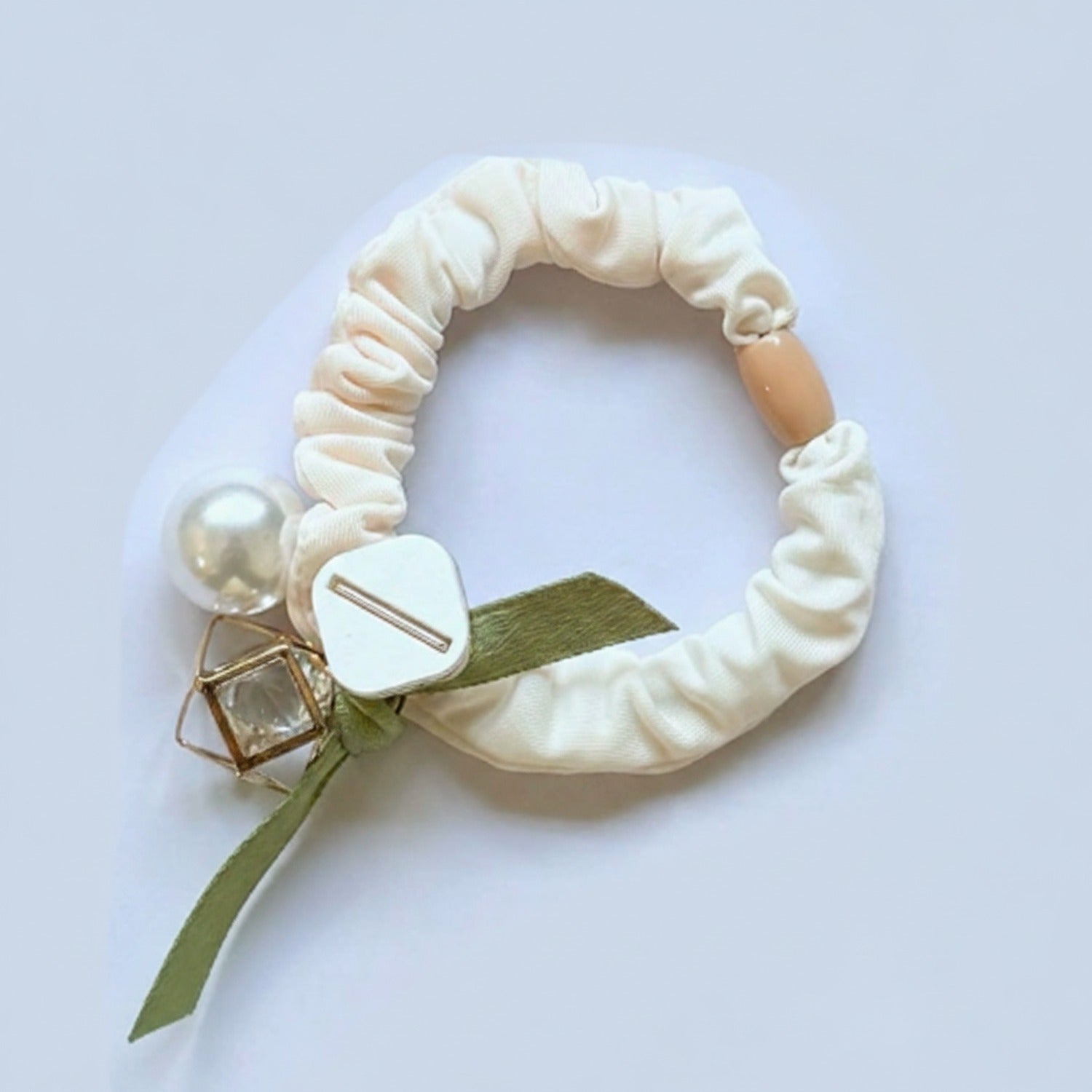 Cream Scrunchie With Pearl And Charm Detail