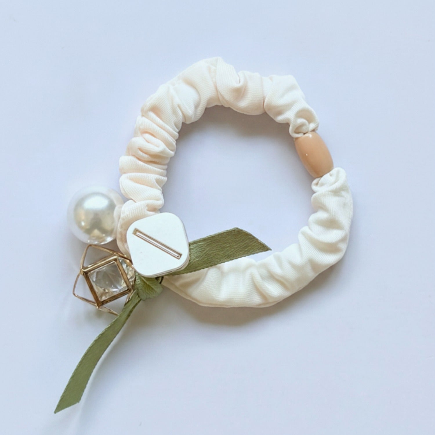 Cream Scrunchie With Pearl And Charm Detail