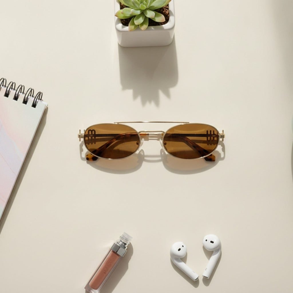 Oval Sunglasses With Geometric Temple Details - Gold Frame Tea Lens