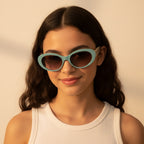 Oval Turquoise Sunglasses With Gold Chain Arms