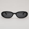 Tortoiseshell Oval Sunglasses with Dark Lenses - Glossy Black Frame Gray Lens – eyewear (view 1)