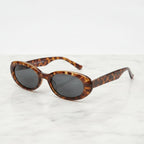 Tortoiseshell Oval Sunglasses with Dark Lenses - Tortoiseshell Frame - Color Variation – eyewear (view 3)