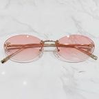 Gradient Oval Rimless Sunglasses With Trim - Dual Pink