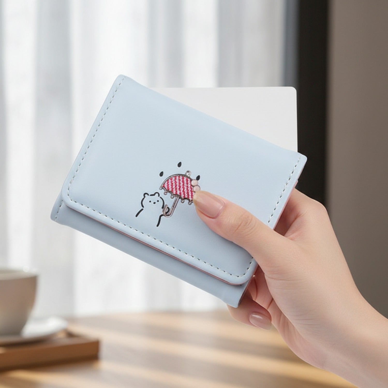 Light Blue Wallet With Girl Holding Umbrella Design