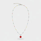 Colorful Beaded Pendant Necklace with Red Charm – jewelry (view 1)