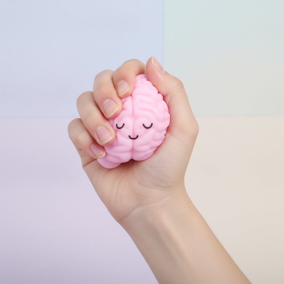 Pink Brain Squishy Toy - squeeze in hand