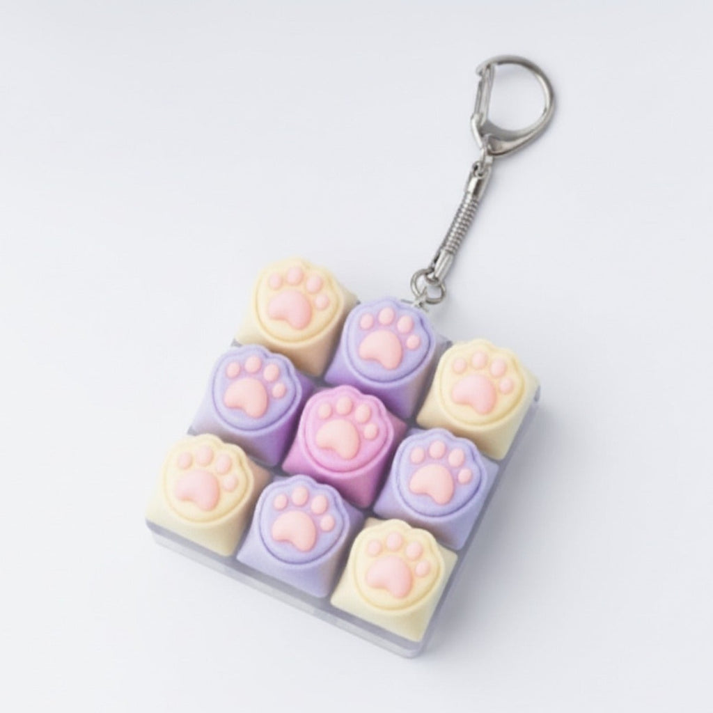 Paw Pad Pop It Keychain - Cream & Purple